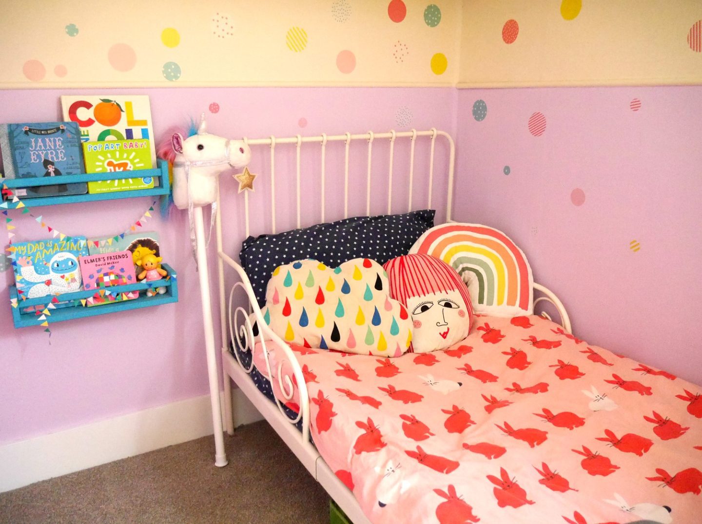 Colourful children's rooms - how to add colour to your family home. Painted purple wall with lavender cupcake