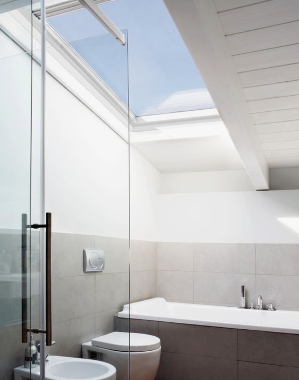 Loft conversion tips - how to use VELUX roof windows in a bathroom extension to create a bright family space 