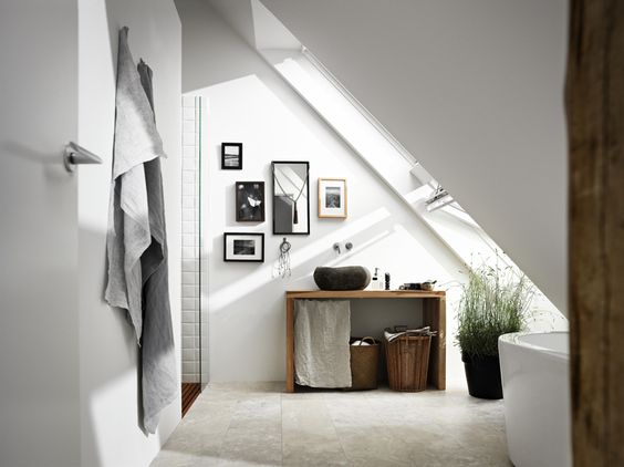 Loft conversion bathroom ideas - how to use VELUX windows to make a small space look bright and airy 