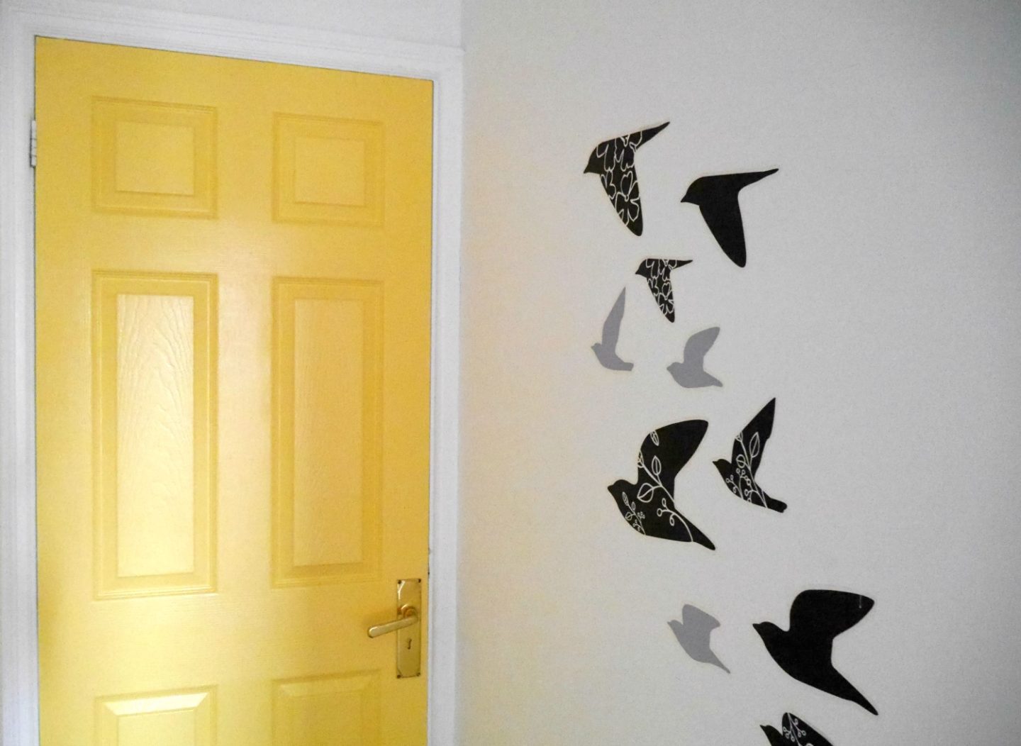 Yellow painted door with Crown Paint's Breatheasy Range